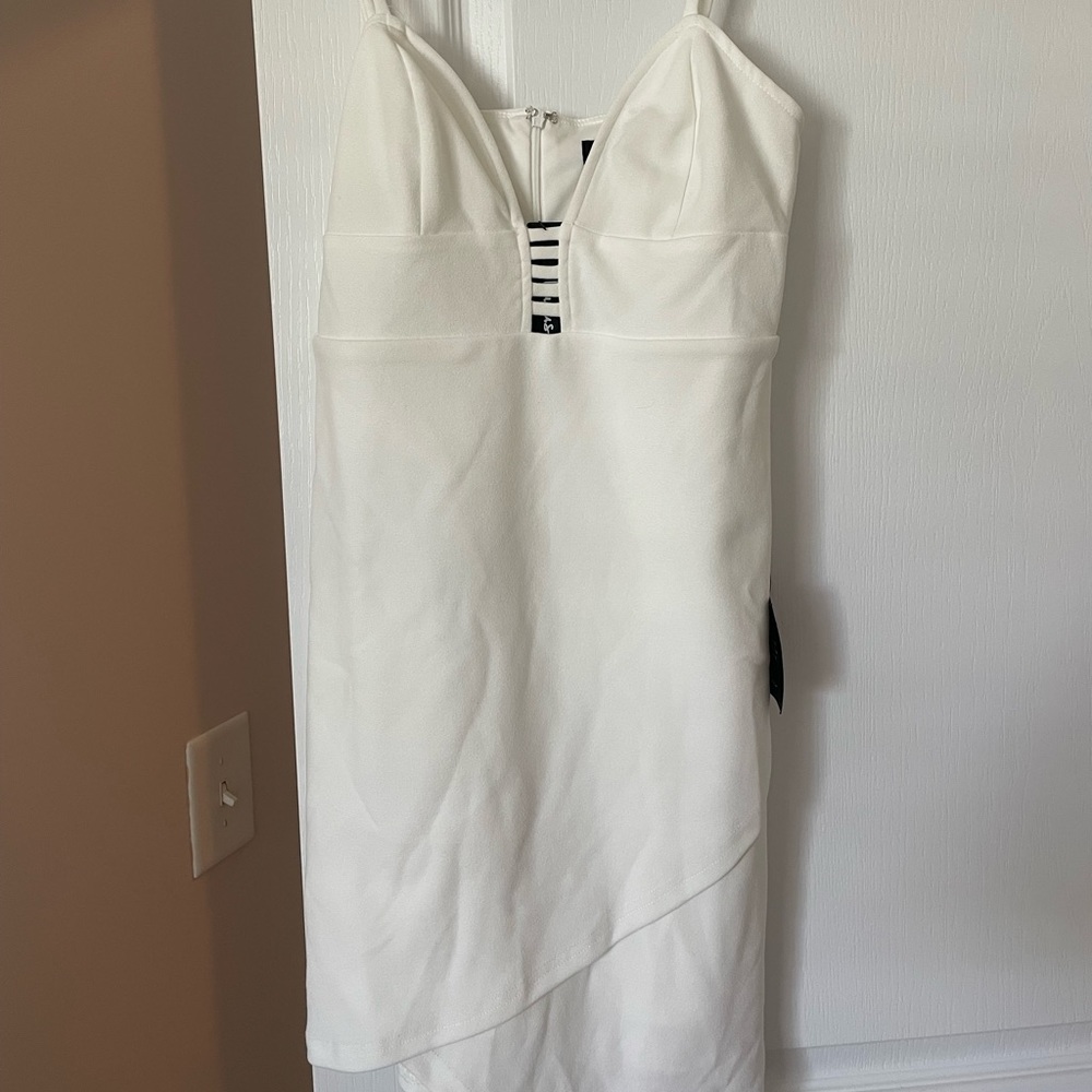 New with tags white mini dress.
